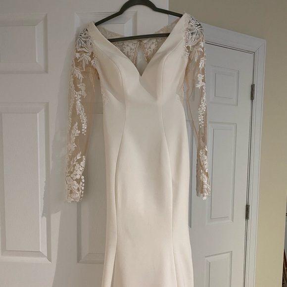 This is a beautiful Justin Alexander wedding dress that is ready for the taking! - Picture 8 of 13
